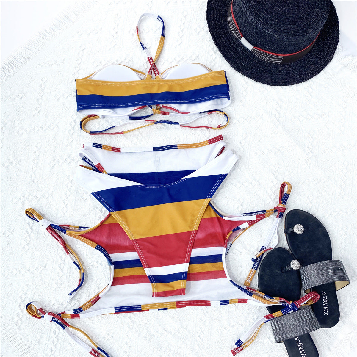 Women's clothing. Striped String Swimsuit