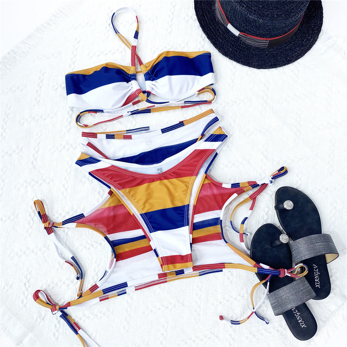 Women's clothing. Striped String Swimsuit